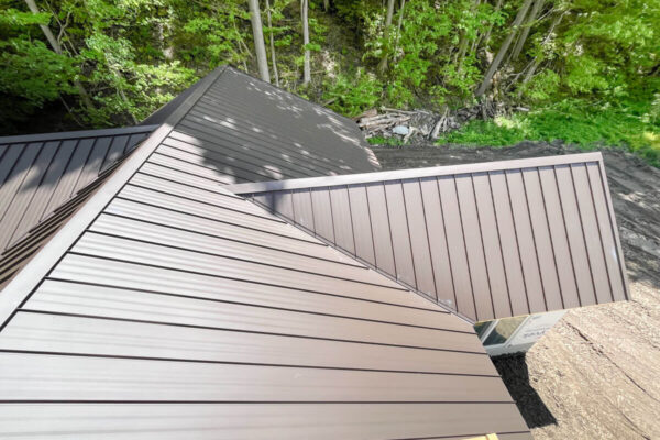 Close-up overhead shot showcasing the clean panels of a lifetime metal roof installation.